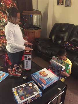 Christmas Gift Recipients Happy to Open their Christmas Gifts