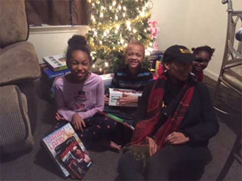 Christmas Gift Recipients Happy to Open their Christmas Gifts