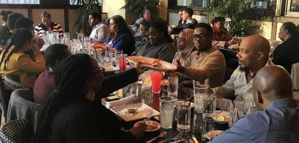 students enjoying dinner out