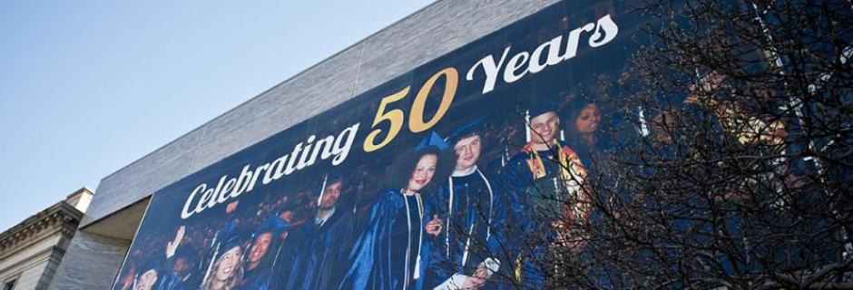 Large Banner on the West Building with the text Celebrating 50 years