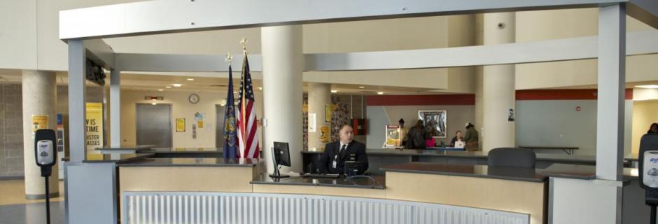 Security and information desk in lobby of Bonnell Building at Community College of Philadelphia.