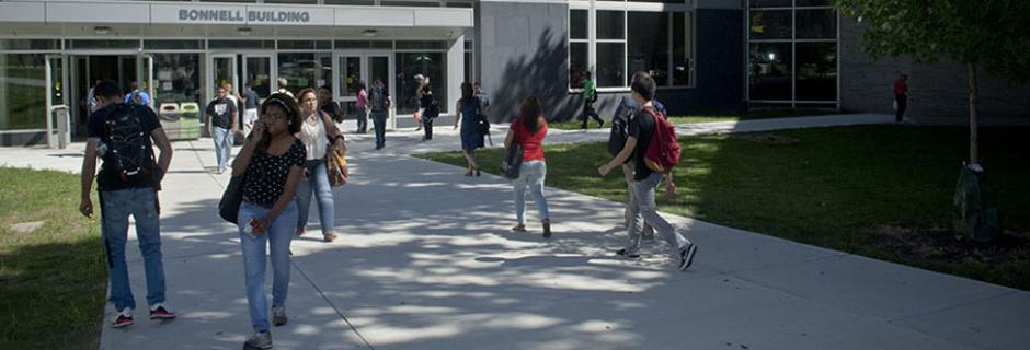 Students walking in and out of Bonnell Building at CCP.