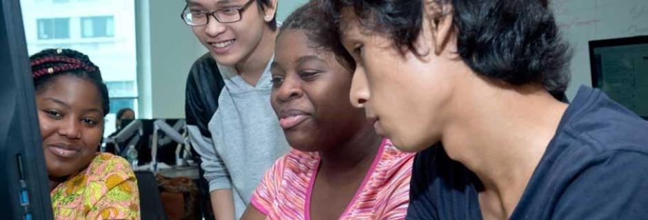 Students tutoring in the computer center