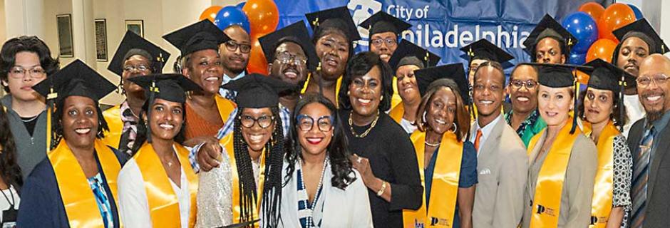 Mayor Parker with new graduates of the CCME program