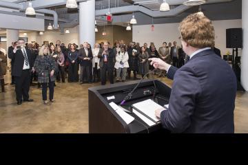 Dr. Sam Hirsch speaks to the crowd about the dual admissions agreement