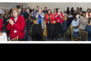 Kathryn Dutkiewicz receives a standing ovation from the crowd