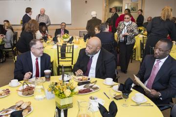 Attendees gather for a breakfast celebrating the Fall 2017 release of the College's Pathways Magazine.