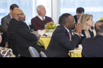 The audience listens to Willie Johnson speak