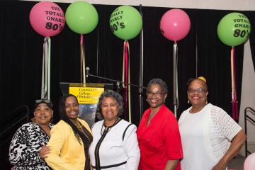 A group smiles for the camera.