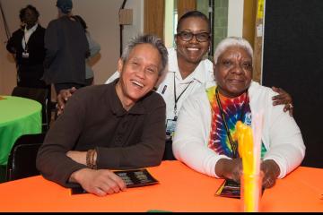 A group smiles for the camera.