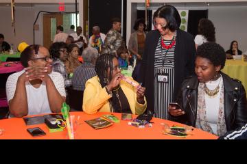 Vice President of Academic Affairs, Judy Gay chats with attendees.