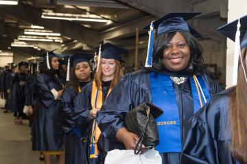 Graduates line up to march.