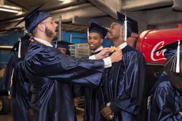 Graduates line up to march.