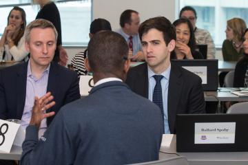 Lawyers assist a client.