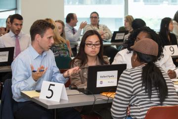 Lawyers assist a client.