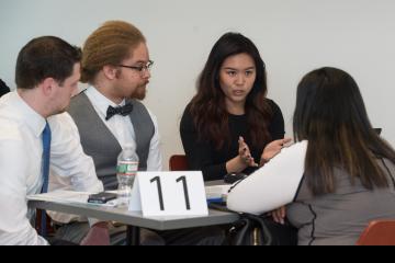 Lawyers assist a client.