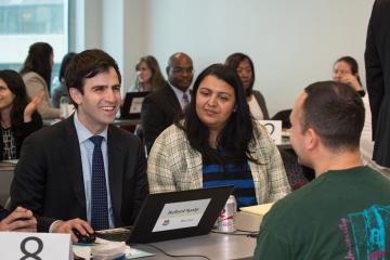 Lawyers assist a client.