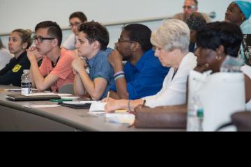 Participants listen to the expert panel.