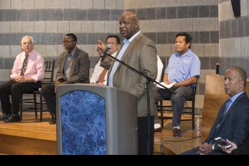 Director of the Office of Diversity and Equity, Simon Brown, addresses the audience.