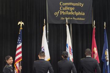 The Color Guard places the flags.