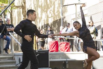 A couple dances for the crowd.