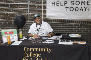 Student Body President Troy Bundy manned the Hurricane Relief table.