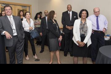 The audience listens to Fred Dukes speak.