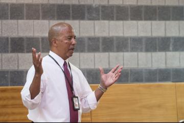 Dr. Generals speaks to the audience.