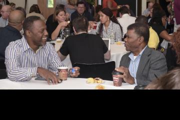 Crowd gathers for Professional Development Week Opening breakfast.