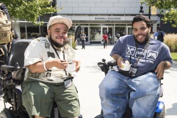 Two students pose with their ice cream.