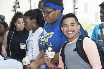 A student poses with his ice cream.