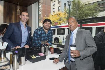 Nick Bayer, Chris Long and Dr. Generals take a break to pose for a photo.