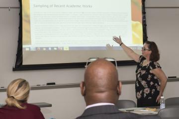 Presenter Kathleen Murphy tells her workshop audience about the fairy tales she writes, including The Frog and the Transgender Prince.