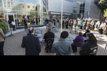 The crowd listens to Stephen Bachovin.