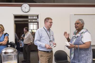 Faculty members gather in the Faculty Center for Teaching and Learning before the Teaching Slam.