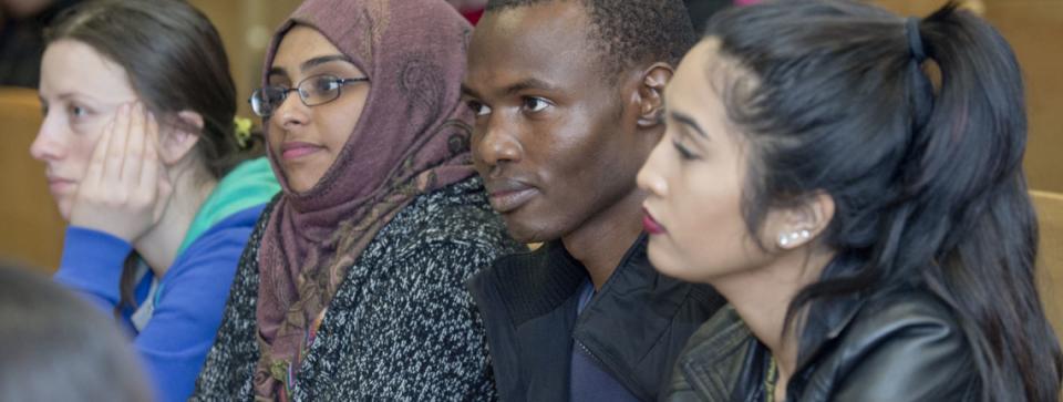 Students attending a lecture on campus